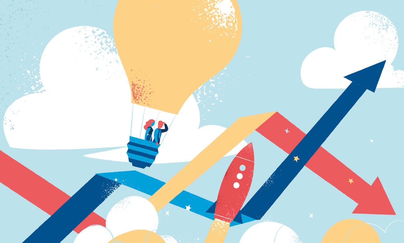 personnes dans une montgolfière regardant les perspectives futures